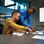 Team of managers discussion in IT business office - Alpha