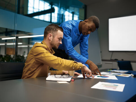 Team of managers discussion in IT business office - Alpha