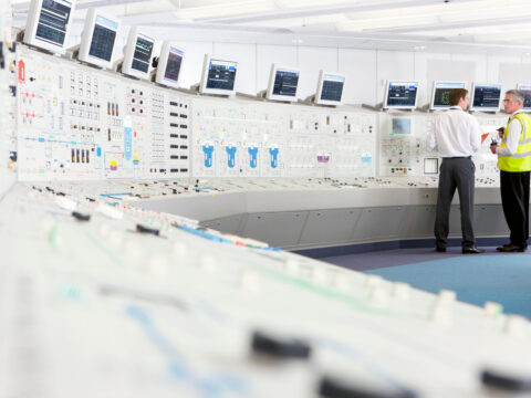 wide-shot-of-a-senior-engineer-in-a-reflector-vest-2026-01-11-09-34-59-utc - Alpha